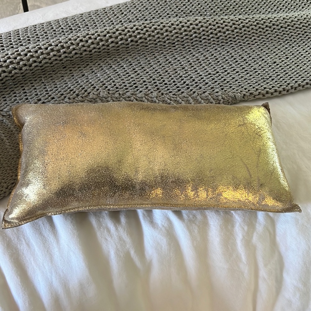 Mini West elm gold leather pillow